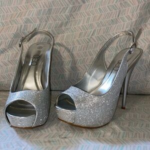 Deb Silver platform stilettos sz 8